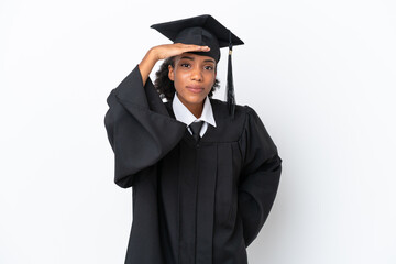 Young university graduate African American woman isolated on white background looking far away with...