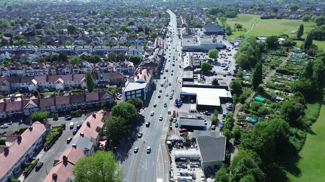 Aerial view of distant car filled road&ndash; resolution drone photography. Ideal for editorial, real estate, and travel use.