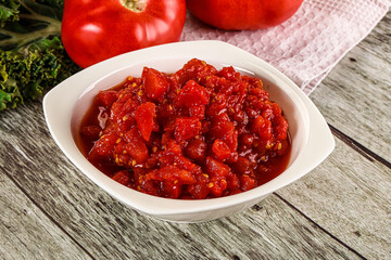 Diced ripe tomato with sauce