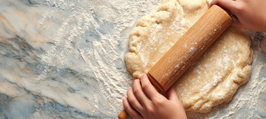 Rolling sugar cookie dough on a floured marble surface