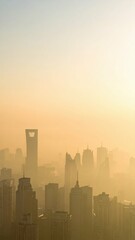 Misty Dawn Over Modern City Skyline Bathed in Soft Golden Light