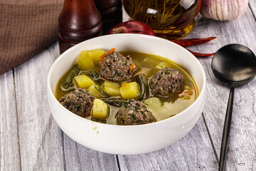 Soup with beef meatballs and vegetables