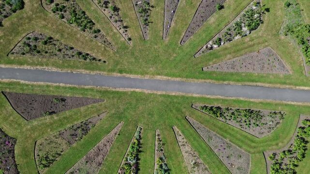 Aerial view of  Arno Gardens, Mersyside &ndash;aerial video of rising shot to reveal full garden space