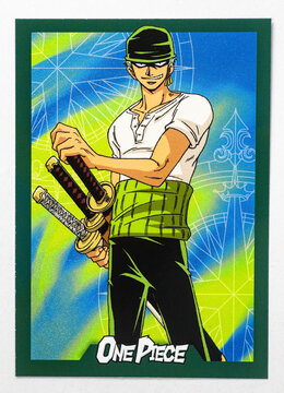 Hamburg, Germany - 05172025: photo of the English Panini One Piece 25th Anniversary paper Trading Card that shows the character called Roronoa Zoro. He is the swordsman of the Straw Hat Pirates.