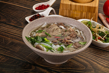 Vietnamese Pho Bo soup with beef and noodles