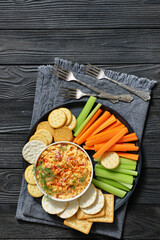 pimento cheese dip served with crackers, veggies