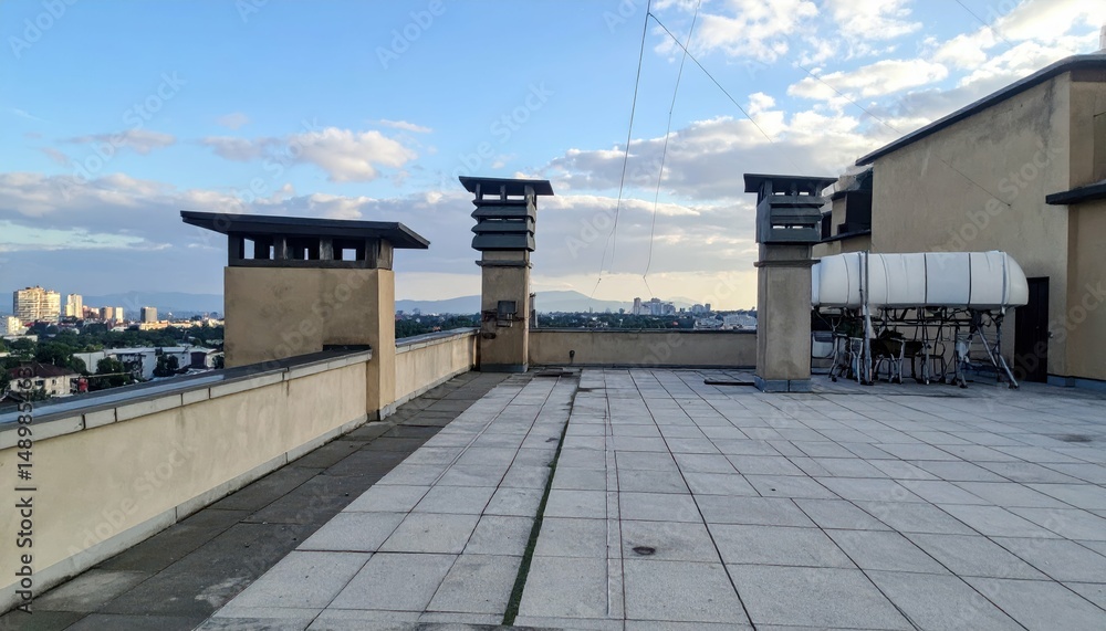 Poster Urban Rooftop Perspective with Depth Elements in Background View
