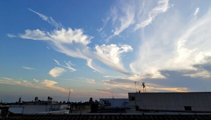 Mysterious Patterns in Sky Surpassing Rooftop at Dusk