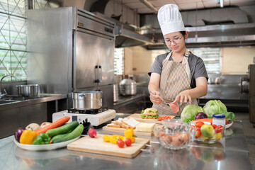 Chef preparing fresh ingredients in a kitchen setting for culinary delight