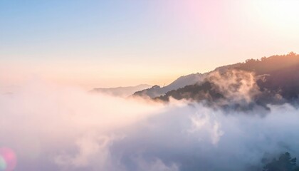 Fototapeta premium Breathtaking sunrise over misty hills landscape photography serene nature environment aerial viewpoint