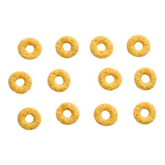 Collection of golden cereal rings arranged in a grid simple breakfast food elements for healthy eating concepts isolated on white isol