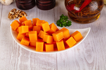 Yellow cheddae cheese cubes snack