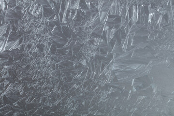 Close-up of frost pattern on glass.
