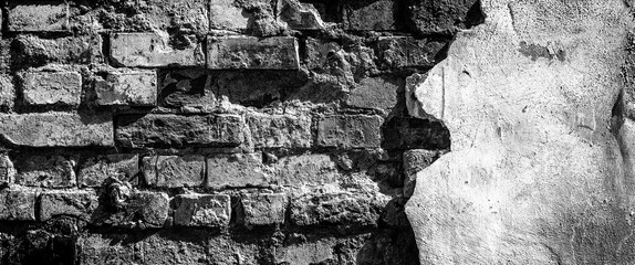 A VERY OLD WALL - Bricks and plaster of an abandoned building
