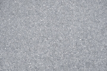 Concrete road surface photographed from above for a light gray background.