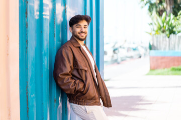 Handsome Arab man at outdoors With happy expression