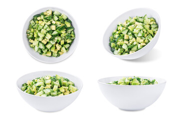 Avocado cucumber salad in a bowl on a white isolated background