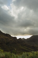 Dramatic Mountain Landscape Under Cloudy Sky