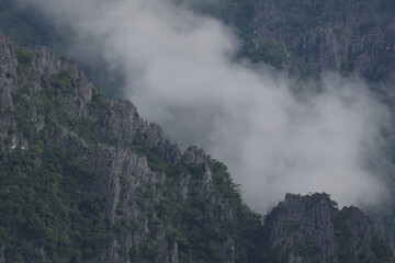 mountain landscape with fog and clouds in Vang Vieng Laos