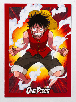 Hamburg, Germany - 05172025: photo of the English Panini One Piece 25th Anniversary paper Trading Card that shows the character called Ruffy.
