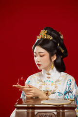Girl wearing Chinese Ming Dynasty Hanfu costume against a red background