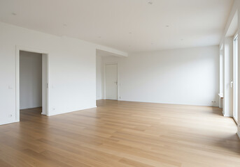 A spacious and modern empty living room with white walls