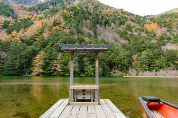 Myojin Pond with Hotaka Shrine in Kamikochi in Autumn, Japanese Alps, Chubu Sangaku National Park