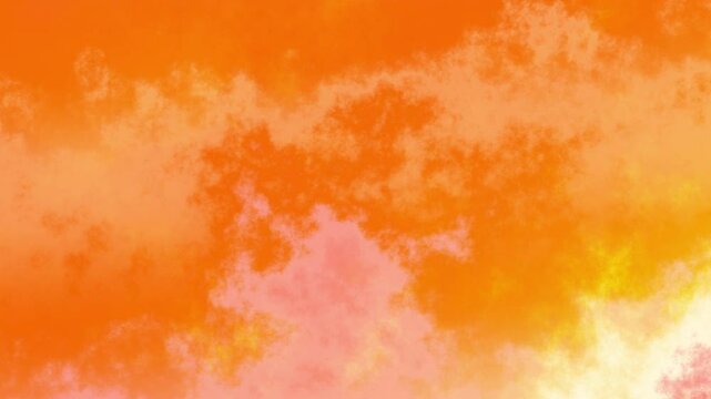 An orange to yellow gradient of ink flows through water in slow motion. Loop background