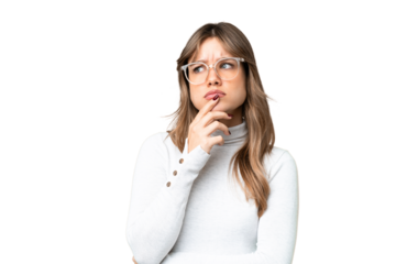 Young girl over isolated chroma key background With glasses and having doubts