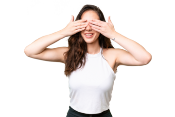 Young caucasian woman isolated over isolated background covering eyes by hands