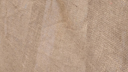 Burlap background and texture. Hessian sackcloth woven fabric texture background in beige cream brown color