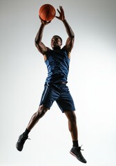 Black Male Basketball Player Shooting a Jump Shot, Isolated