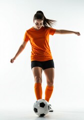 Female Forward Kicking the Ball Powerfully, Isolated