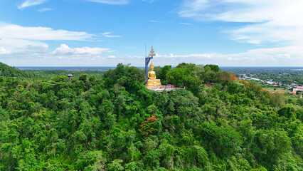 Buriram's Pride. Phra Suphattharabophit and the Stunning Landscape of Khao Kradong, buddha statue in thailand.