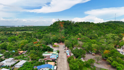 Buriram's Pride. Phra Suphattharabophit and the Stunning Landscape of Khao Kradong, buddha statue in thailand.