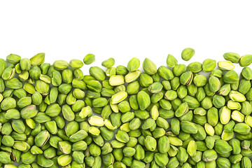 Fresh green pistachios isolated on a white background