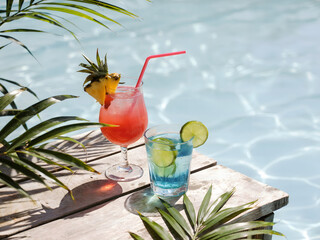Refreshing Tropical Cocktails Beside a Sparkling Swimming Pool