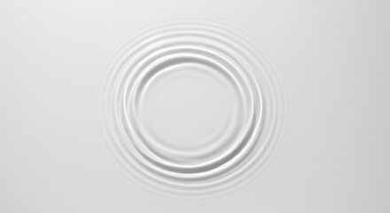 Obraz premium Circular ripple pattern on light gray surface
