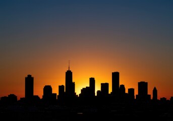 Naklejka premium City silhouette sunset