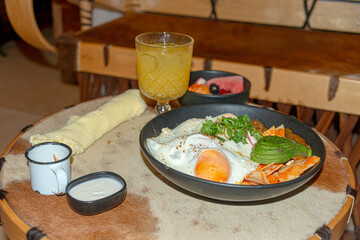 Chilaquiles with Fried Egg – Traditional Mexican Breakfast..