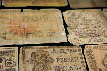 old uzbekistan banknotes with arabic and cyrillic writings