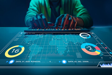 Hands typing on a futuristic keyboard with digital holographic dashboard displaying world map, statistics, data analytics complex visualizations and interface elements