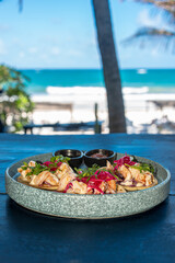 Obraz premium Shrimp Tacos on a Caribbean Beach in Boca Paila, Tulum.