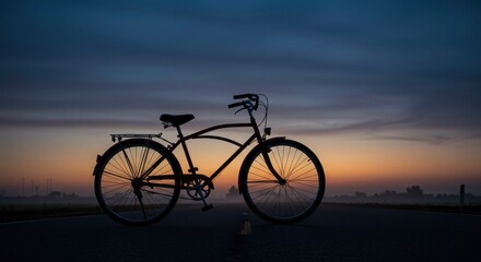 Fototapeta premium Vintage bicycle silhouette at sunset