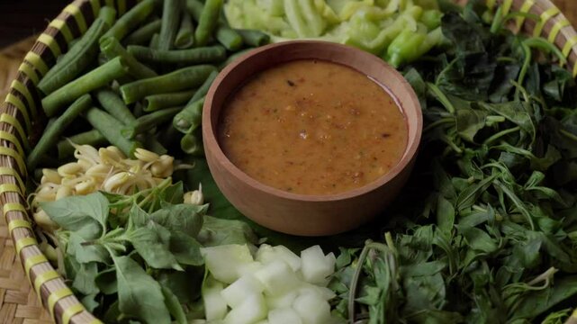 Indonesian Culinary Ingredients for Pecel on a Rattan Tray