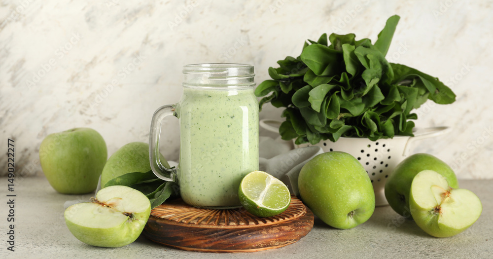 Canvas Prints mason jar of fresh spinach smoothie with lime and apples on white background