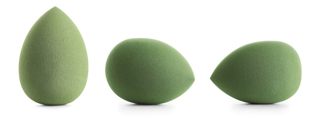 Set of makeup sponges on white background