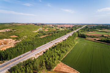 Aerial View of Highway Through Rural Landscape