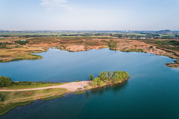Aerial View of a Serene Lakeside Landscape