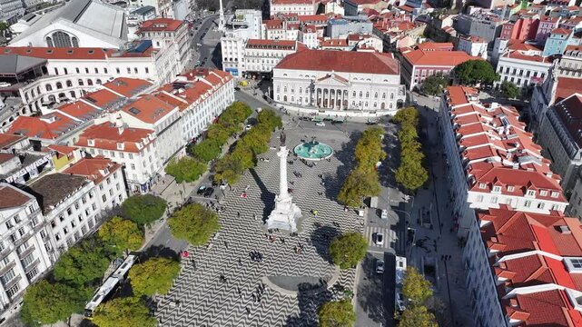 Dom Pedro Iv Square At Lisbon District Of Lisbon Portugal. Aerial View Of A City Park Surrounded By Busy Streets And Buildings. Business Sky Downtown Cityscape. Business Panoramic City.